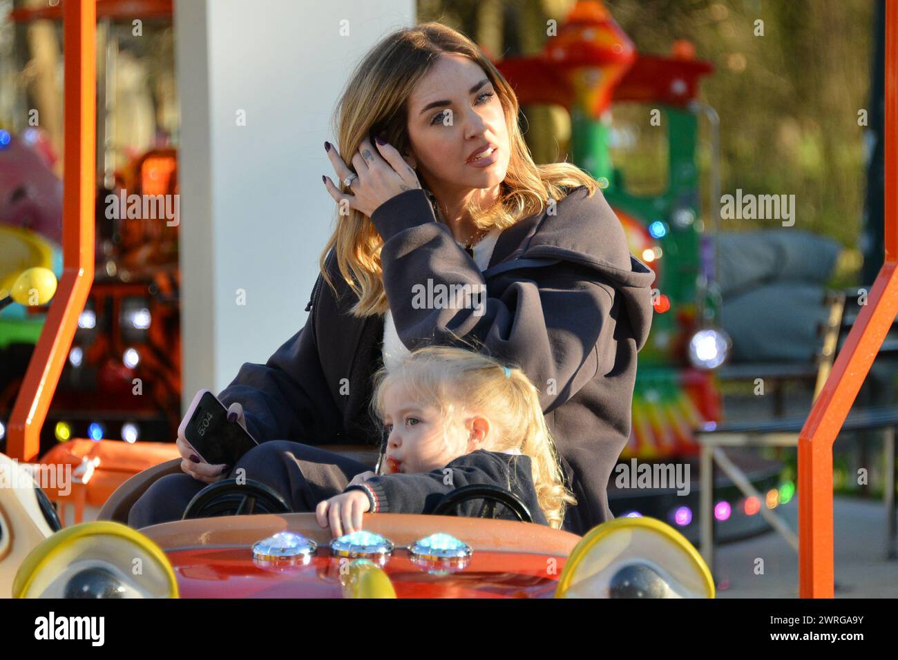 Milan, . 12th Mar, 2024. Claudio Mangiarotti rights copyright Milan - Chiara Ferragni's single life after returning from the United States, she spends the afternoon in the gardens of Parco Sempione with her children Leone and Vittoria, her mother Marina di Guardo. The opportunity to also celebrate the birthday of sister Francesca Ferragni and son Riccardo. Note the sculpted abs of Chiara Ferragni Ph Claudio Mangiarotti Credit: Independent Photo Agency/Alamy Live News Stock Photo