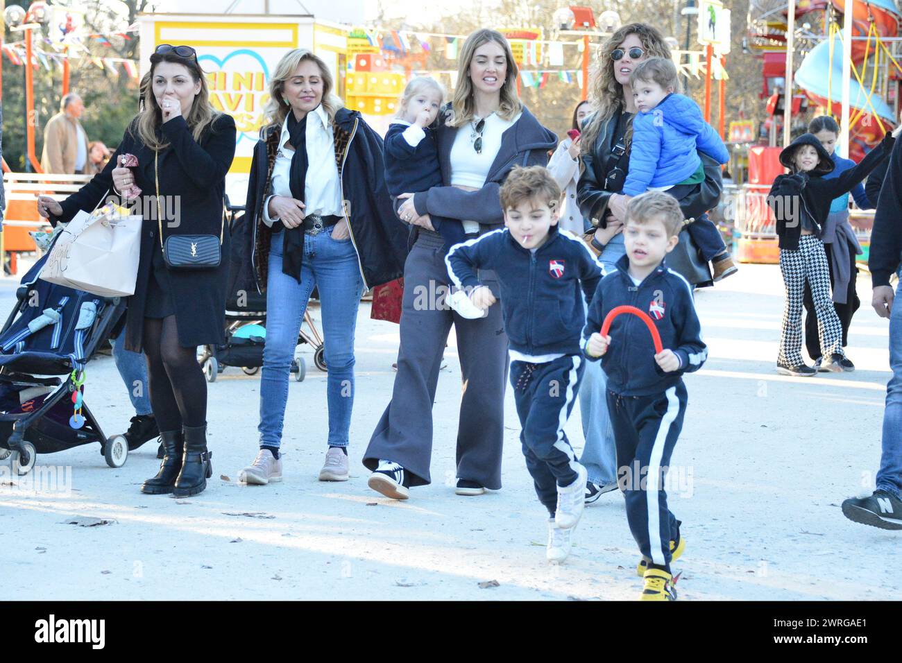 Milan, . 12th Mar, 2024. Claudio Mangiarotti rights copyright Milan - Chiara Ferragni's single life after returning from the United States, she spends the afternoon in the gardens of Parco Sempione with her children Leone and Vittoria, her mother Marina di Guardo. The opportunity to also celebrate the birthday of sister Francesca Ferragni and son Riccardo. Note the sculpted abs of Chiara Ferragni Ph Claudio Mangiarotti Credit: Independent Photo Agency/Alamy Live News Stock Photo