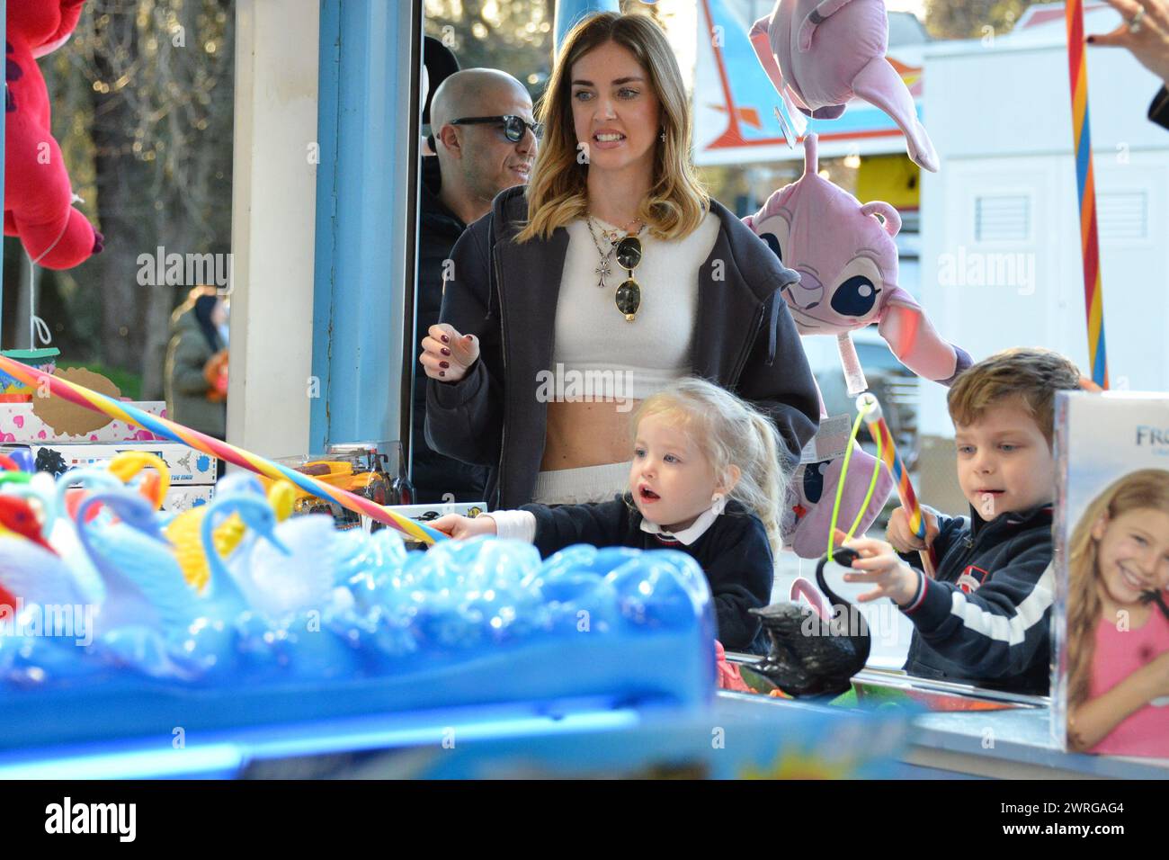 Milan, . 12th Mar, 2024. Claudio Mangiarotti rights copyright Milan - Chiara Ferragni's single life after returning from the United States, she spends the afternoon in the gardens of Parco Sempione with her children Leone and Vittoria, her mother Marina di Guardo. The opportunity to also celebrate the birthday of sister Francesca Ferragni and son Riccardo. Note the sculpted abs of Chiara Ferragni Ph Claudio Mangiarotti Credit: Independent Photo Agency/Alamy Live News Stock Photo
