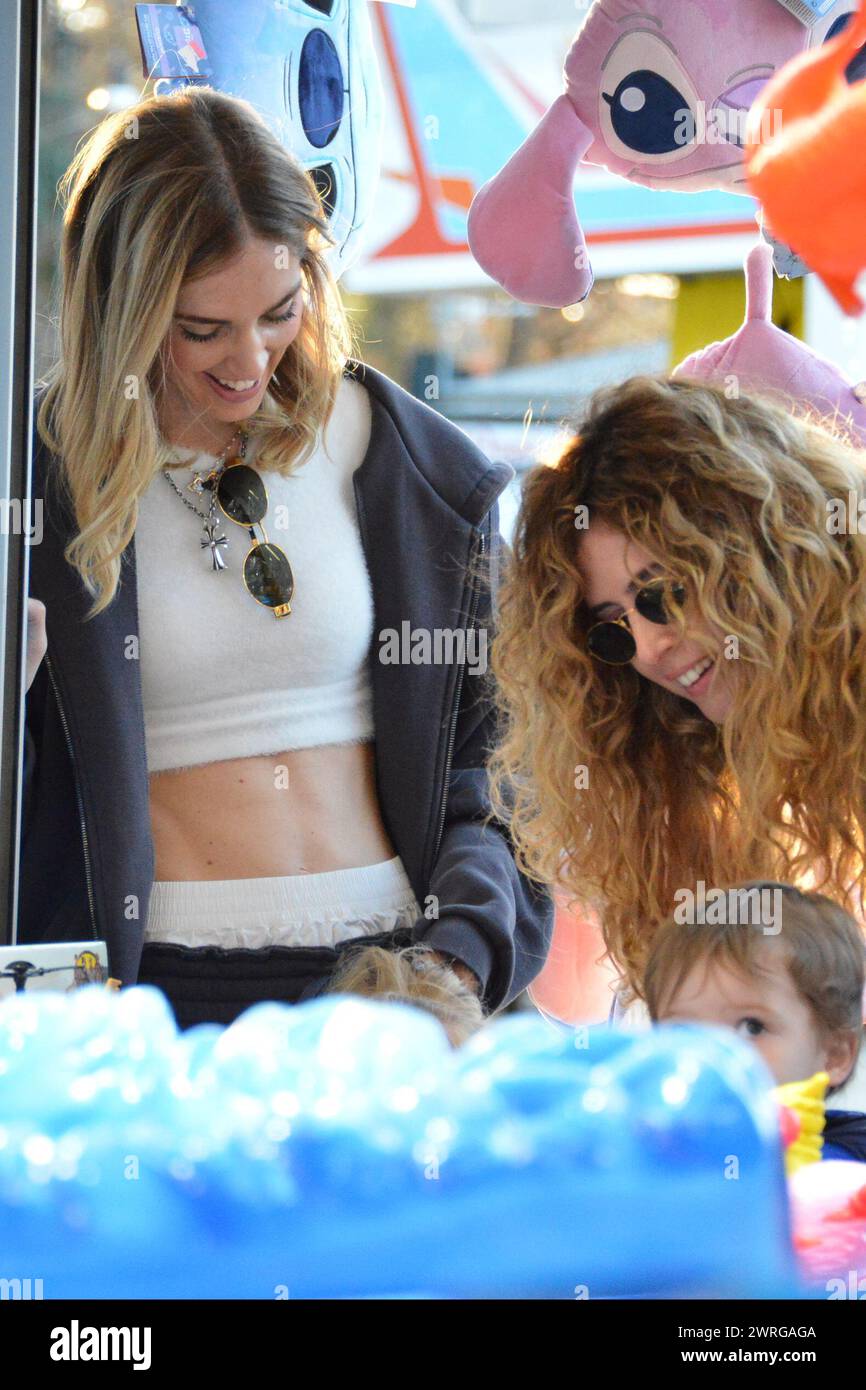 Milan, . 12th Mar, 2024. Claudio Mangiarotti rights copyright Milan - Chiara Ferragni's single life after returning from the United States, she spends the afternoon in the gardens of Parco Sempione with her children Leone and Vittoria, her mother Marina di Guardo. The opportunity to also celebrate the birthday of sister Francesca Ferragni and son Riccardo. Note the sculpted abs of Chiara Ferragni Ph Claudio Mangiarotti Credit: Independent Photo Agency/Alamy Live News Stock Photo