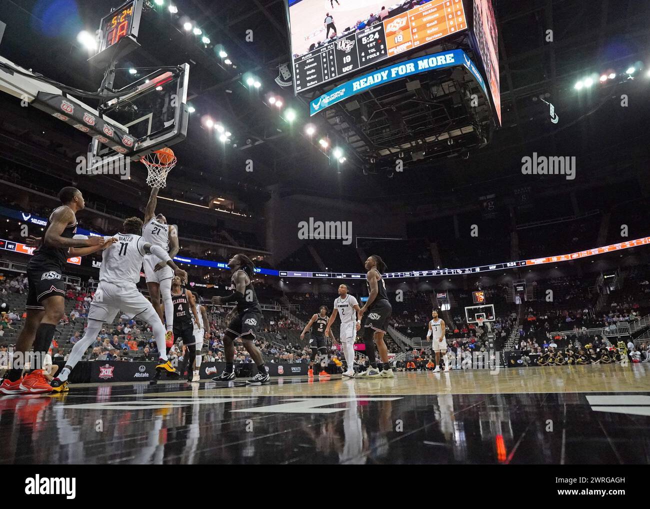 MAR 12 2024 UCF Knights forward C.J. Walker (21) makes a layup in the