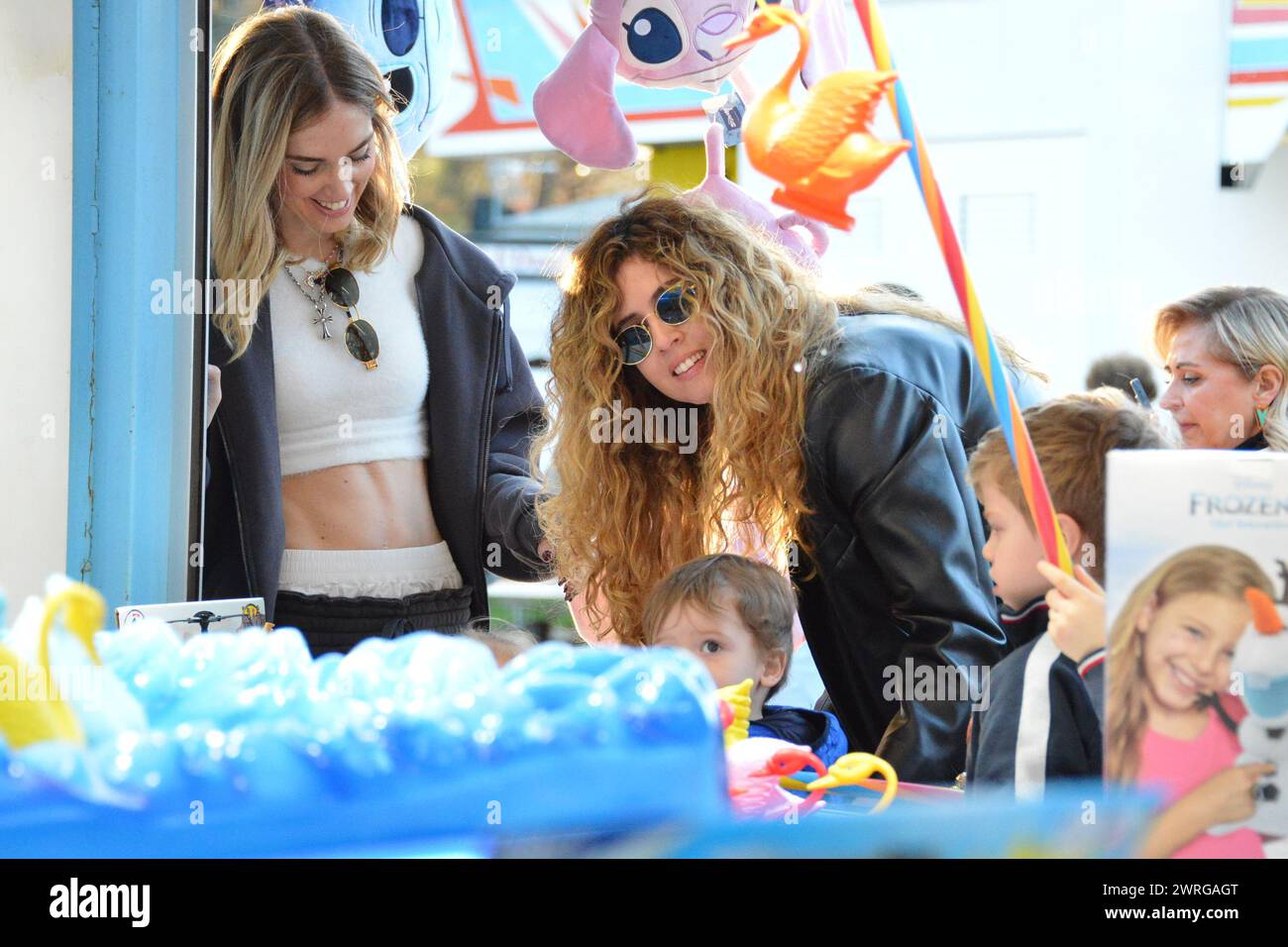 Milan, . 12th Mar, 2024. Claudio Mangiarotti rights copyright Milan - Chiara Ferragni's single life after returning from the United States, she spends the afternoon in the gardens of Parco Sempione with her children Leone and Vittoria, her mother Marina di Guardo. The opportunity to also celebrate the birthday of sister Francesca Ferragni and son Riccardo. Note the sculpted abs of Chiara Ferragni Ph Claudio Mangiarotti Credit: Independent Photo Agency/Alamy Live News Stock Photo