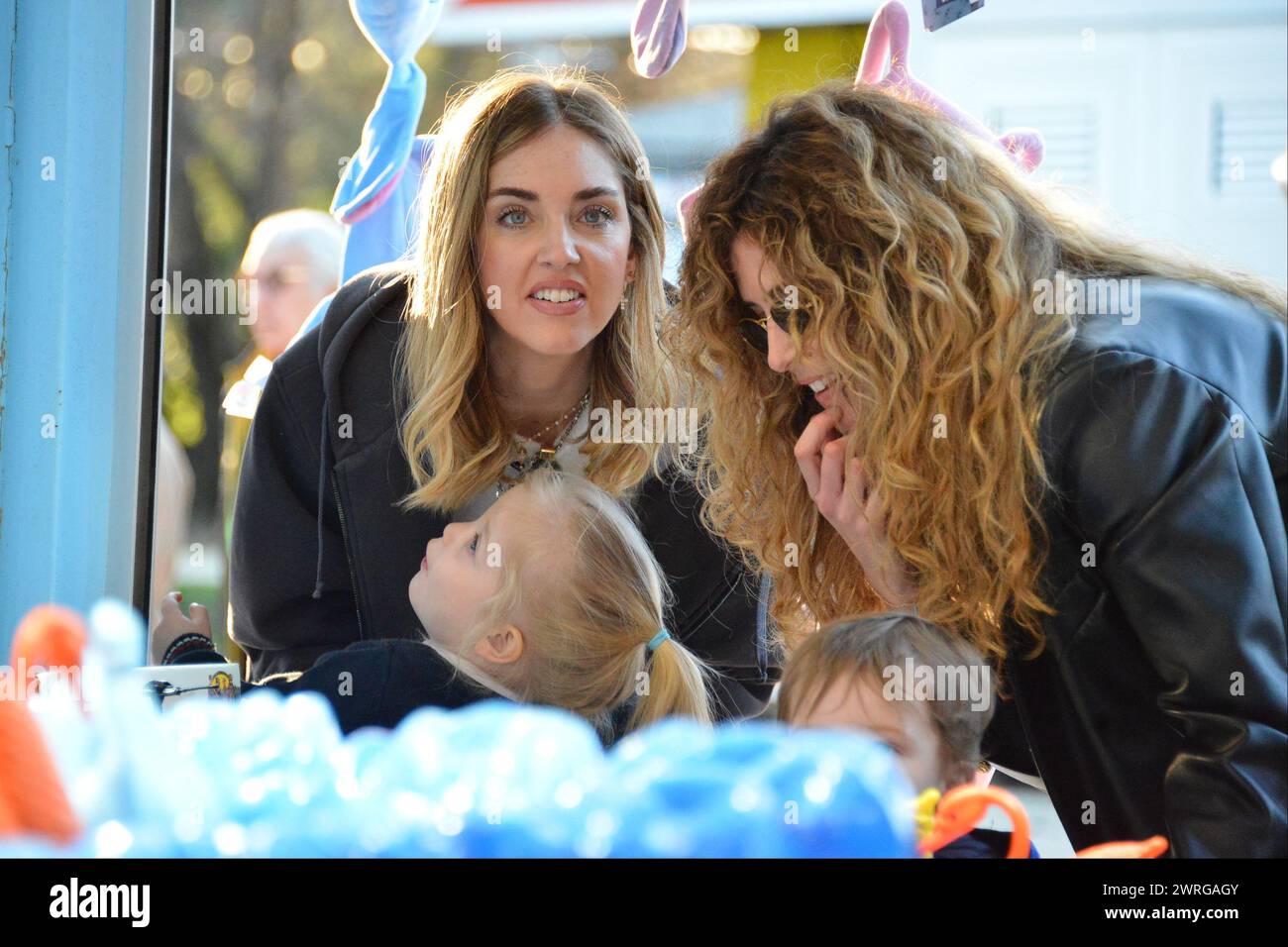 Milan, . 12th Mar, 2024. Claudio Mangiarotti rights copyright Milan - Chiara Ferragni's single life after returning from the United States, she spends the afternoon in the gardens of Parco Sempione with her children Leone and Vittoria, her mother Marina di Guardo. The opportunity to also celebrate the birthday of sister Francesca Ferragni and son Riccardo. Note the sculpted abs of Chiara Ferragni Ph Claudio Mangiarotti Credit: Independent Photo Agency/Alamy Live News Stock Photo
