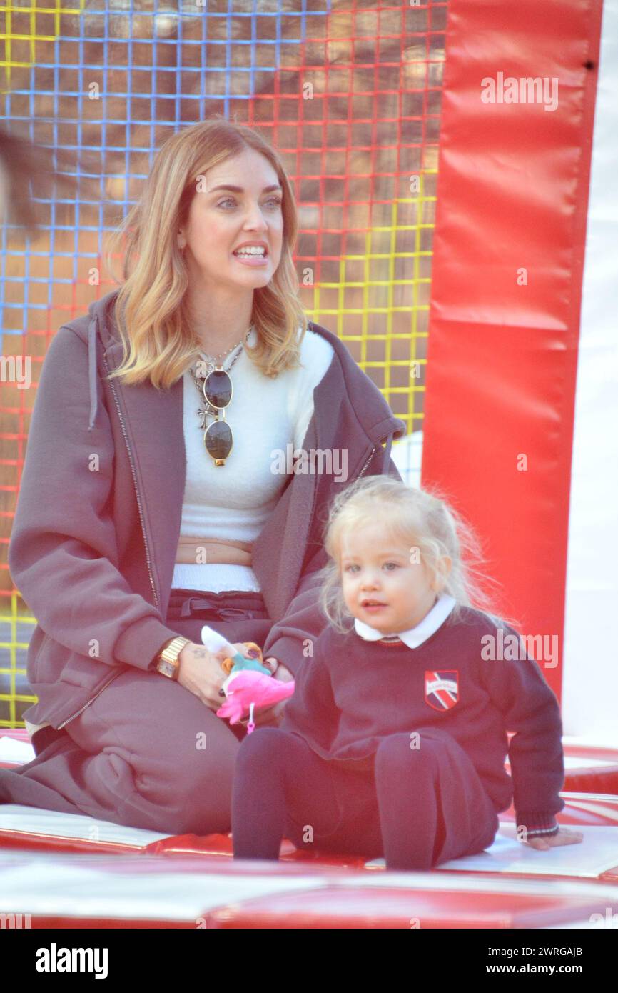 Milan, . 12th Mar, 2024. Claudio Mangiarotti rights copyright Milan - Chiara Ferragni's single life after returning from the United States, she spends the afternoon in the gardens of Parco Sempione with her children Leone and Vittoria, her mother Marina di Guardo. The opportunity to also celebrate the birthday of sister Francesca Ferragni and son Riccardo. Note the sculpted abs of Chiara Ferragni Ph Claudio Mangiarotti Credit: Independent Photo Agency/Alamy Live News Stock Photo