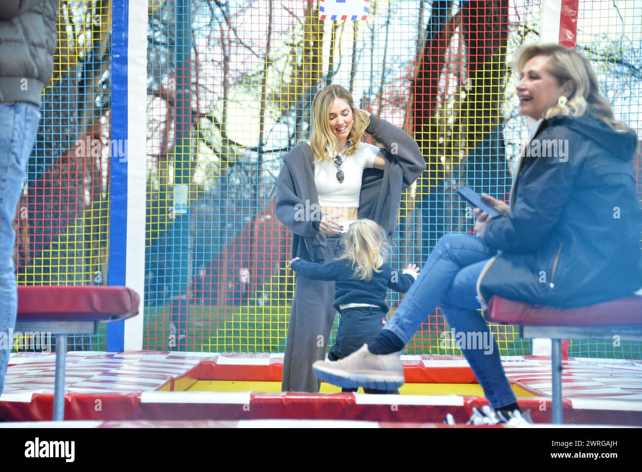 Milan, . 12th Mar, 2024. Claudio Mangiarotti rights copyright Milan - Chiara Ferragni's single life after returning from the United States, she spends the afternoon in the gardens of Parco Sempione with her children Leone and Vittoria, her mother Marina di Guardo. The opportunity to also celebrate the birthday of sister Francesca Ferragni and son Riccardo. Note the sculpted abs of Chiara Ferragni Ph Claudio Mangiarotti Credit: Independent Photo Agency/Alamy Live News Stock Photo
