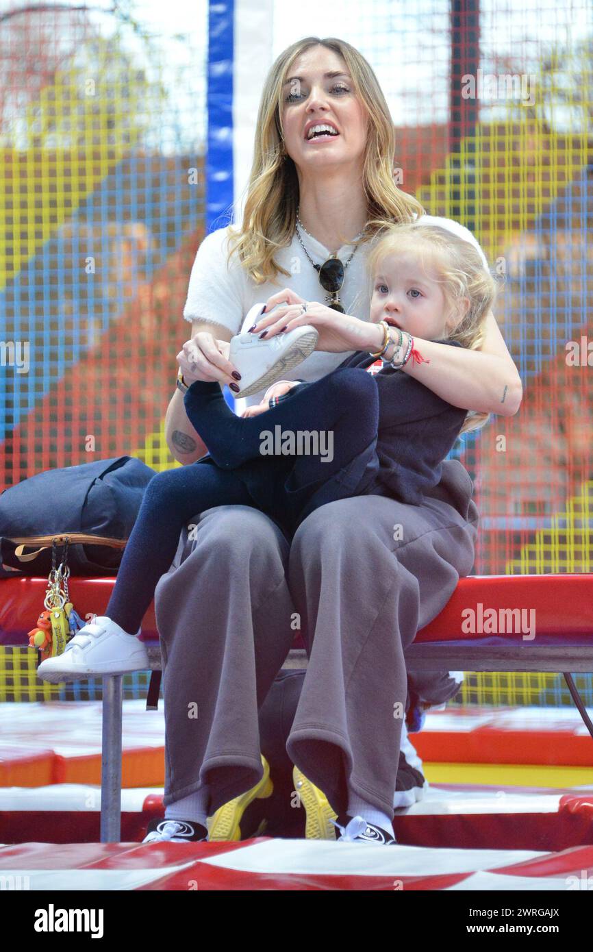 Milan, . 12th Mar, 2024. Claudio Mangiarotti rights copyright Milan - Chiara Ferragni's single life after returning from the United States, she spends the afternoon in the gardens of Parco Sempione with her children Leone and Vittoria, her mother Marina di Guardo. The opportunity to also celebrate the birthday of sister Francesca Ferragni and son Riccardo. Note the sculpted abs of Chiara Ferragni Ph Claudio Mangiarotti Credit: Independent Photo Agency/Alamy Live News Stock Photo