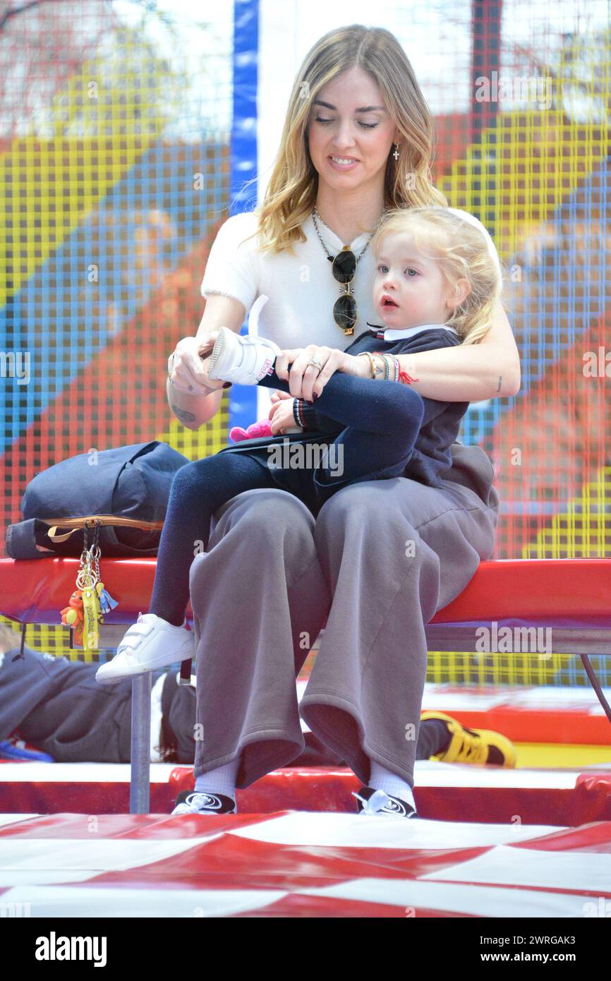 Milan, . 12th Mar, 2024. Claudio Mangiarotti rights copyright Milan - Chiara Ferragni's single life after returning from the United States, she spends the afternoon in the gardens of Parco Sempione with her children Leone and Vittoria, her mother Marina di Guardo. The opportunity to also celebrate the birthday of sister Francesca Ferragni and son Riccardo. Note the sculpted abs of Chiara Ferragni Ph Claudio Mangiarotti Credit: Independent Photo Agency/Alamy Live News Stock Photo