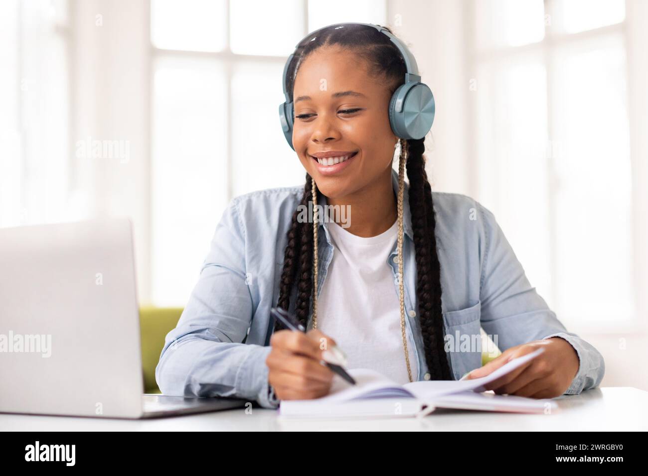 Student studying with headphones hi-res stock photography and images ...