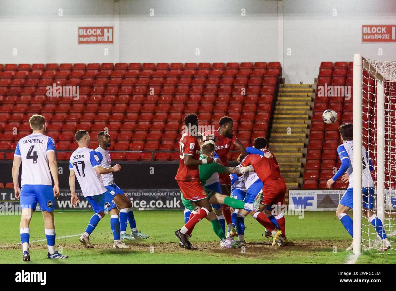 Walsall, UK. 12th Mar, 2024. Walsall's Rollin Meyanese gets his head to