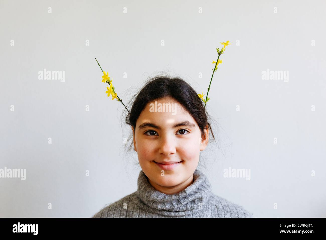 Girl in yellow flowers hi-res stock photography and images - Alamy