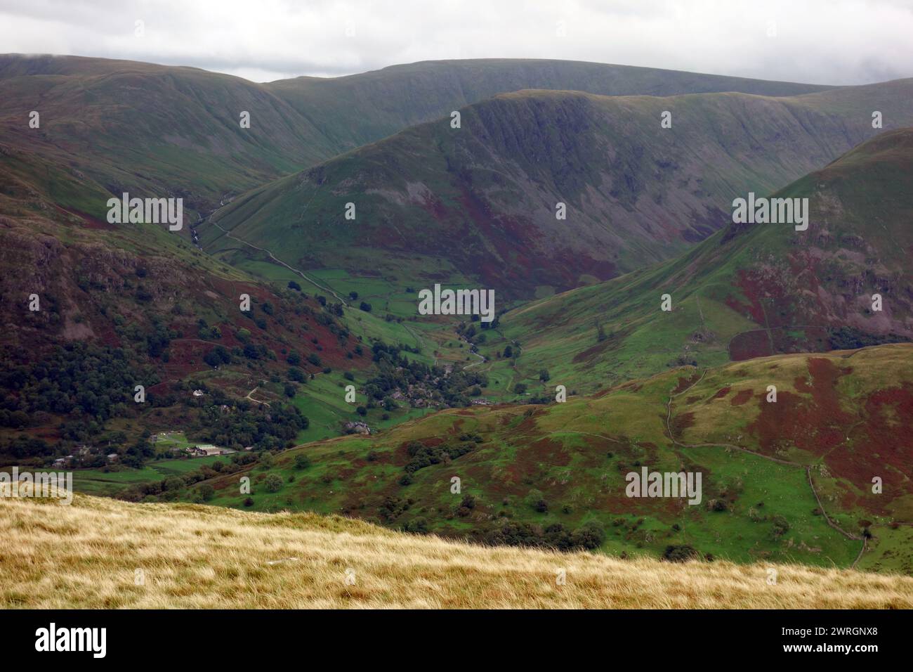 The Farming Hamlet of Hartsop and the Wainwright 'Gray Crag' from  the Wainwright 'Birks' in Patterdale, Lake District National Park, Cumbria, England Stock Photo