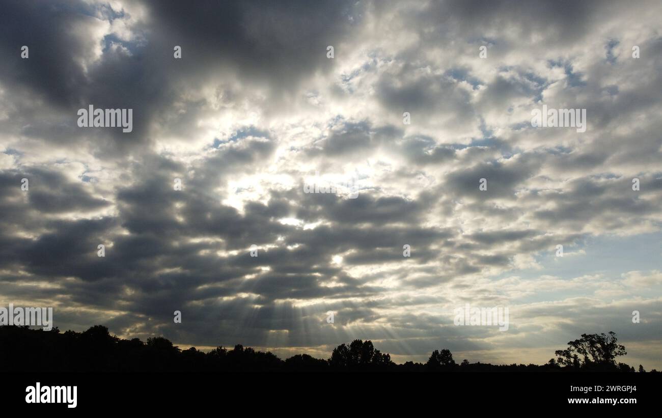 dramatic clouds in the sky with the silhouette of houses, Letterkenny, Co. Donegal, Ireland Stock Photo