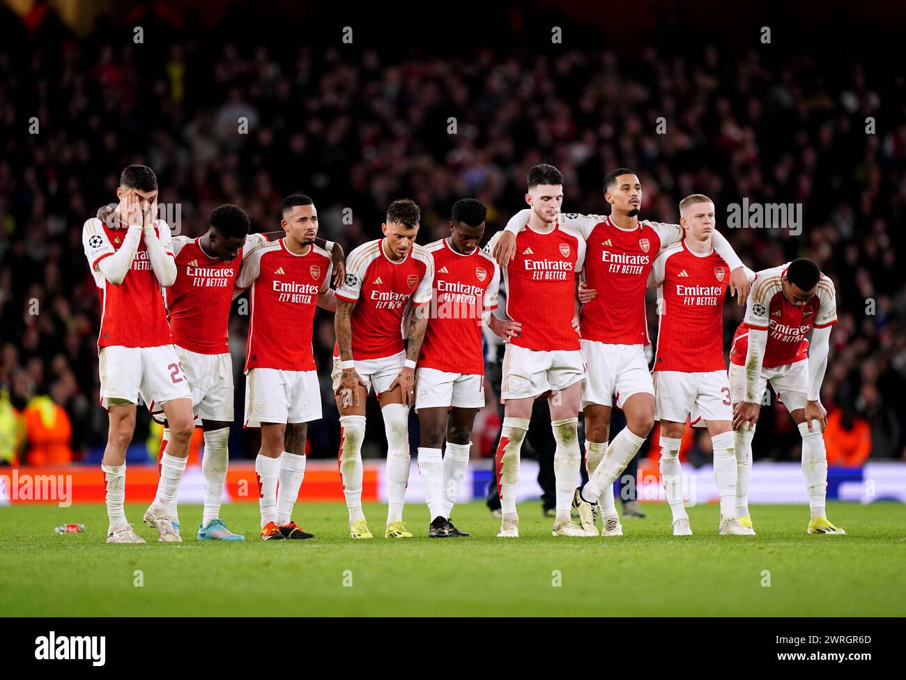 Arsenal players during the penalty shoot-out of the UEFA Champions League Round of 16, second leg match at the Emirates Stadium, London. Picture date: Tuesday March 12, 2024. Stock Photo