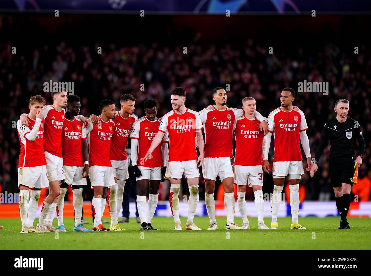 Arsenal players during the penalty shoot-out of the UEFA Champions League Round of 16, second leg match at the Emirates Stadium, London. Picture date: Tuesday March 12, 2024. Stock Photo