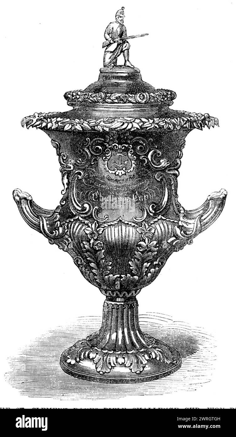 The St. Clement Danes Rifle Challenge Cup, won by Captain Scrivener, 1864. 'The prizes to the Westminster Rifles (the Queen's) were presented on the 9th January by Lady Constance Grosvenor, in Westminster Hall. Among the company prizes was the St. Clement Danes challenge cup, a large and beautiful vase, of the value of 60 gs. [ie guineas]. It was subscribed for by the inhabitants of St. Clement Danes, and was won, together with a gold pin (the portcullis) and a marble clock-case, by Captain T. P. Scrivener, of the seventeenth (or St. Clement Danes) company. On receiving the articles from Lady Stock Photo