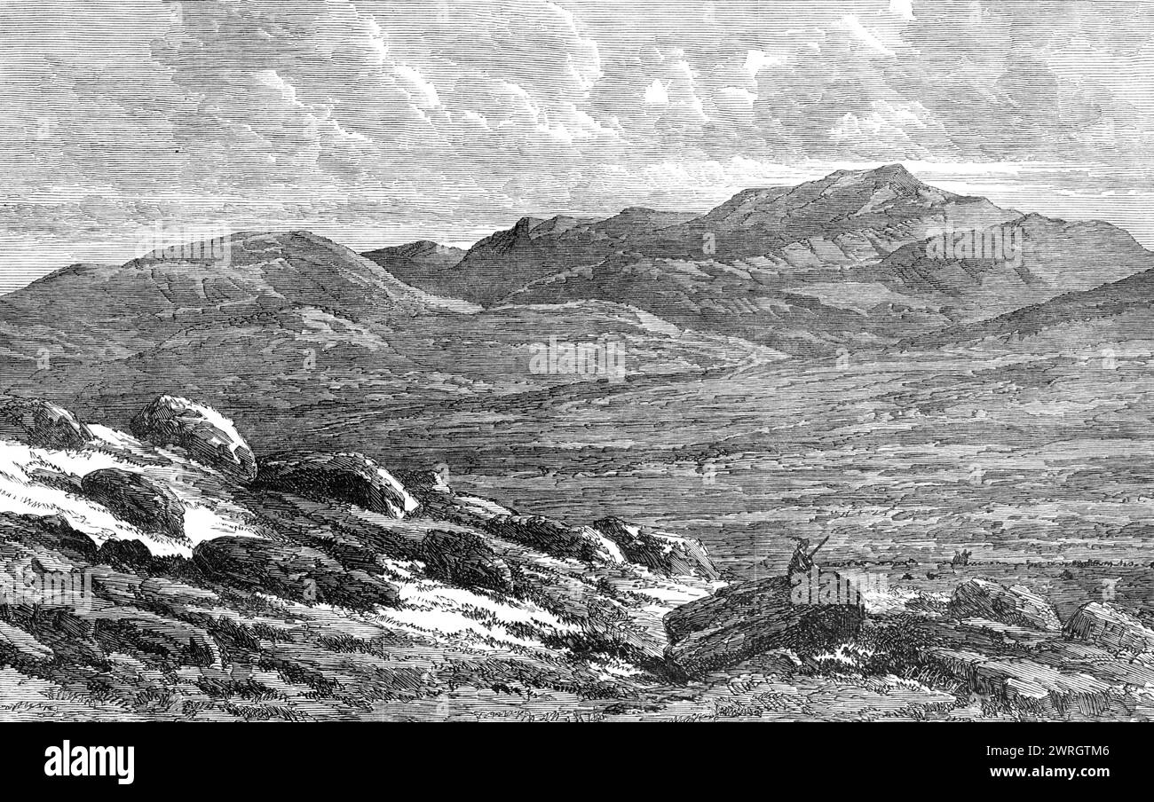 The Scottish Highlands near Balmoral - view of Lochnagar, 1864. Landscape at '...Loch-na-Gar, to which Byron has dedicated a few well-known verses. Here is a small black lake, which sleeps at the foot of a wide corrie or cleft near the summit of a mountain some miles to the south-east of Braemar. But in our View this lake, from which the mountain takes its name, is hidden by a lofty range of precipitous rocks, which run sheer down to the edge of the water, inclosing it with a perfect wall. The ground in front, strewn with white crags or tors, slopes upwards to the top of the mountain. The fore Stock Photo