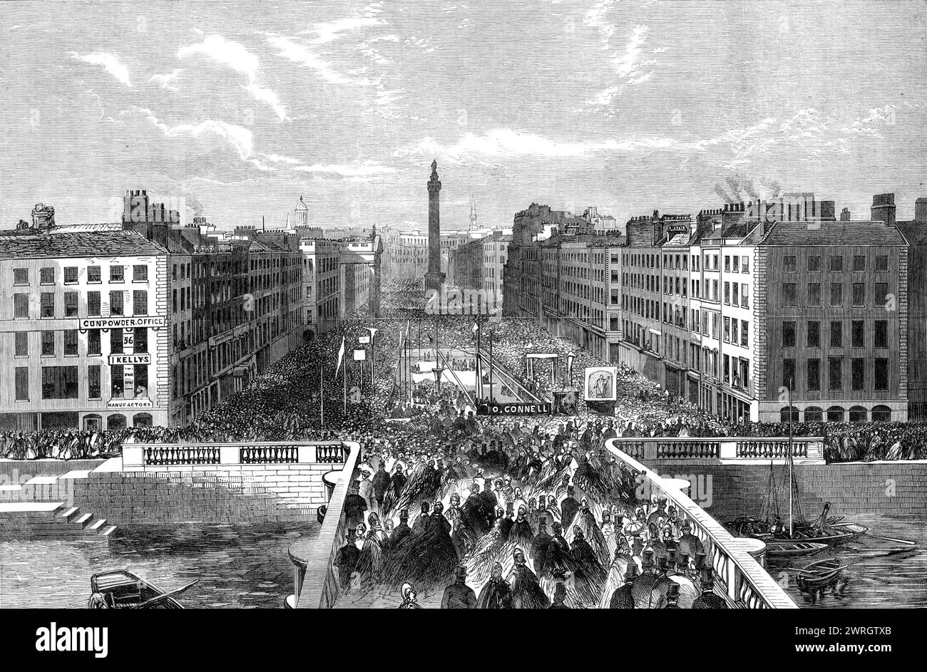 Laying the foundation-stone of the O'Connell Monument in Sackville-street, Dublin, 1864. Engraving from a photograph by Mr. W. H. Monney. '...the streets of Dublin were thronged with persons wearing green sashes and rosettes, and every point from which a view of the procession could be [had] was crowded with spectators...In the procession, which started at noon...the associated trades took the lead. About one o'clock the City Hall was passed by the first banner, which was green, inscribed &quot;Memory of O'Connell, the Immortal Liberator.&quot;...Various Roman Catholic...societies...next appea Stock Photo