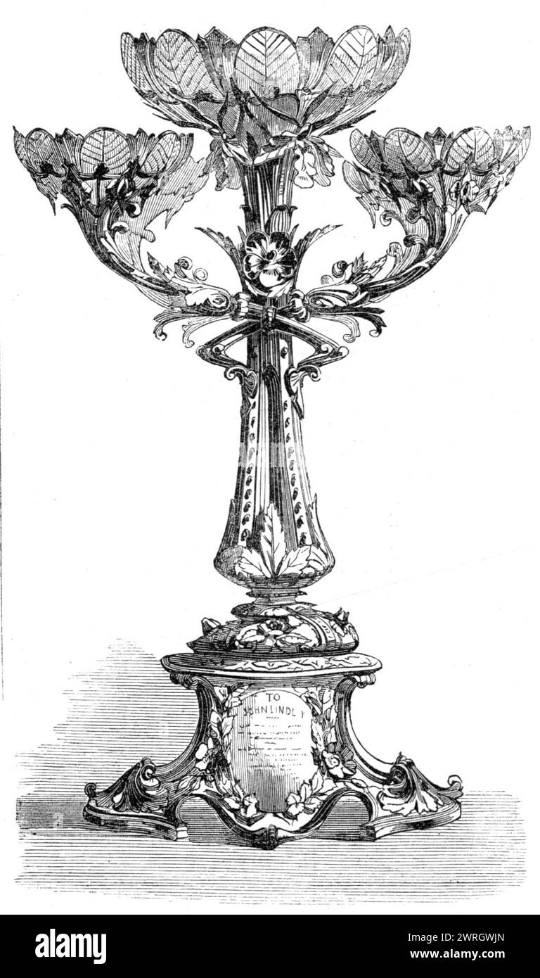 Testimonial to Dr. Lindley, from the Royal Horticultural Society, 1864. Solid silver &#xe9;pergne designed and made by Williams and Co., silversmiths, expressing thanks for Dr. Lindley's '...long and laborious services to the society and to the cause of science generally...By his literary labours...in producing those admirable books on systematic botany and vegetable physiology...as well as by his efficient services as a professor of University College, Dr. Lindley has earned a high degree of public esteem...the character of its ornamentation [has] a peculiar significance for Dr. Lindley, who Stock Photo