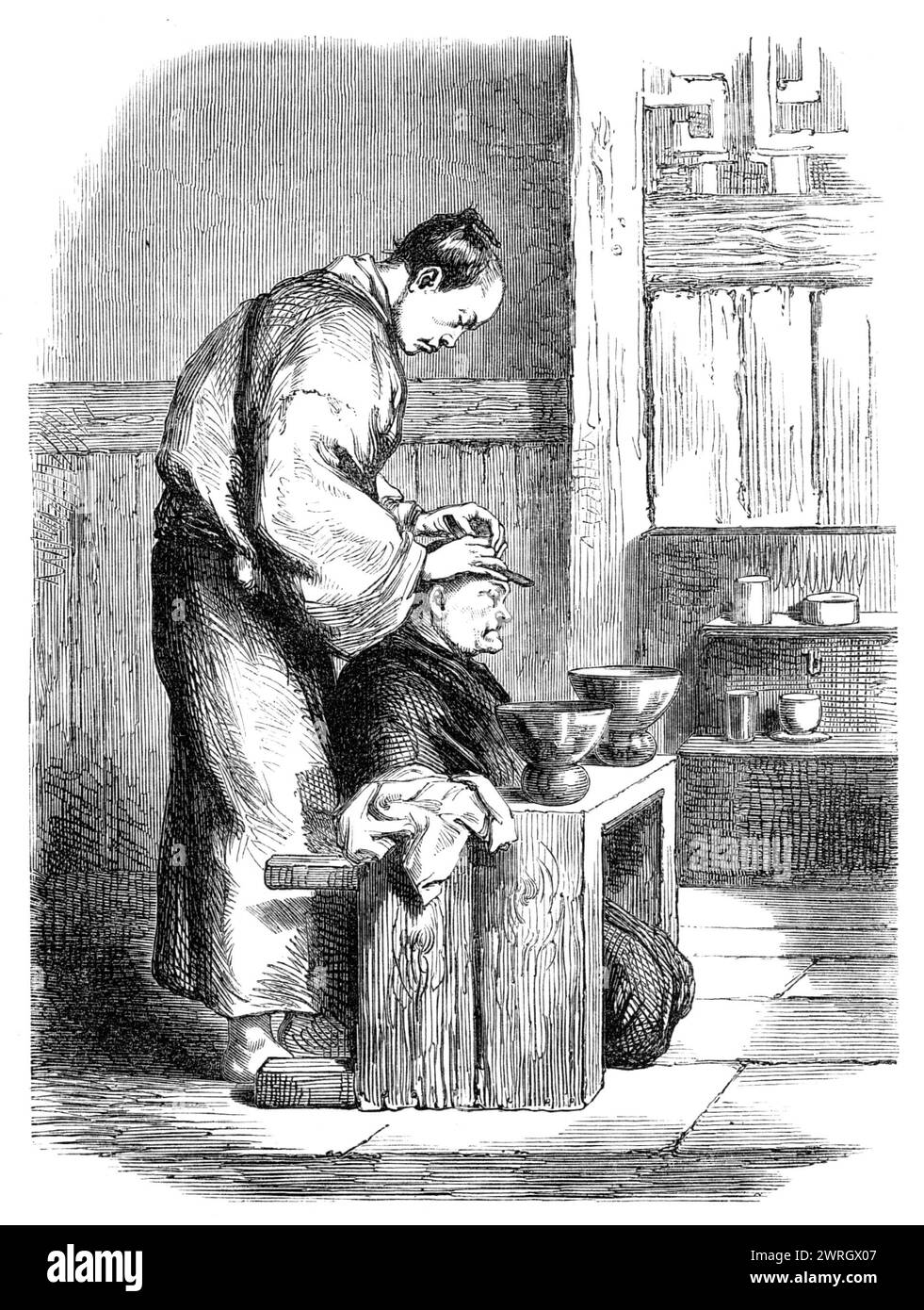 A Japanese barber - from a sketch by our special artist, 1864. 'We present this week another of those characteristic Illustrations of the manners and customs of the Japanese people, with which our Artist and Correspondent at Yokohama has abundantly supplied us. The sketch we have here engraved represents a Japanese barber in the act of dressing the head of one of his patients. He is gathering up the topknot, which is to be tied with an ornamental band, the rest of the crown being scrupulously shaved. The whole operation is tedious enough, but the elderly gentleman whom we see under the barber' Stock Photo