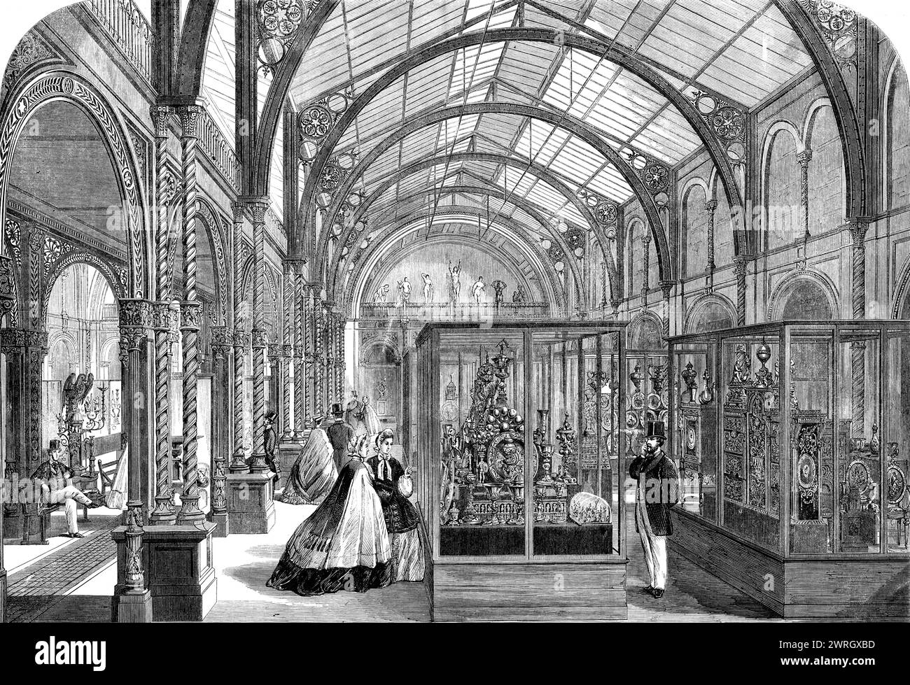 The Loan Collection of works of art at South Kensington Museum, [London], 1862. Display in what became the Victoria and Albert Museum, of pieces '...of the mediaeval renaissance, and more recent periods...in a miniature Crystal Palace, the rooms being lofty, spacious, well proportioned, and capitally lighted from the glass roof above...[There were] sculptures in marble and terra-cotta, carvings in ivory, art bronzes, furniture, objects of ancient Irish and Anglo-Saxon art, various works of mediaeval art; ecclesiastical utensils, &amp;c.; &quot;Henri Deux&quot; ware...decorative plate...vases a Stock Photo