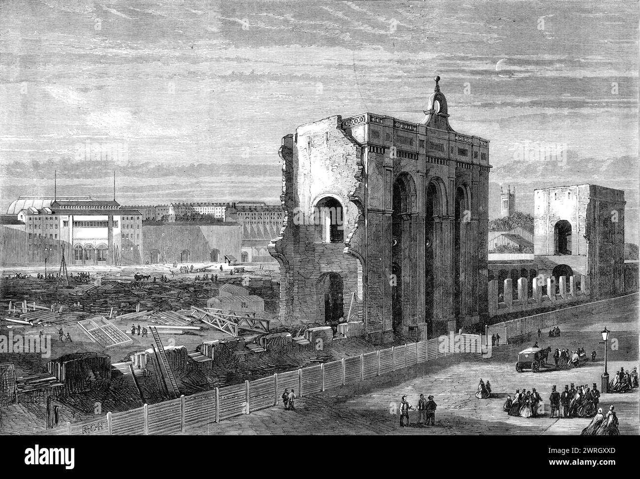 Ruins of the Great Exhibition Building of 1862, [London], (1864). Engraving from a sketch '...looking in an easterly direction along the Cromwell-road...The grand central entrance appears in the foreground; and, beyond this, a portion of the tower at the comer of the Exhibition-road. In the background are the buildings attached to the Gardens of the Horticultural Society, which mark the sight of the Exhibition Refreshment Rooms. On Tuesday last the Engineers and labourers completed the clearing away the debris of the two towers in the Exhibition-road, which had been dislodged by gunpowder. Pro Stock Photo