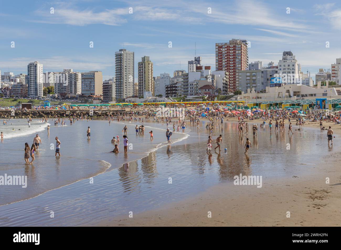 Mar del Plata, Argentina - January 15th, 2024: People enjoy the sea at Stella Maris beach in Mar del Plata. Stock Photo