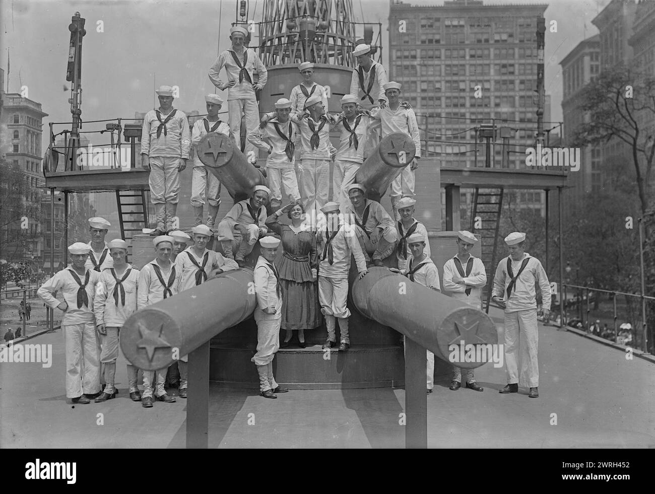 Mabel Garrison on U.S.S. Recruit, 16 Jul 1917. Soprano opera singer Mabel Garrison Siemonn (1886-1963) with sailors on board the U.S.S. Recruit, a wooden mockup of a battleship built in Union Square, New York City by the Navy to recruit seamen and sell Liberty Bonds during World War I. Stock Photo