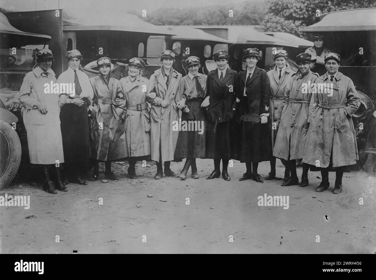 British Voluntary Aid ambulance drivers at front, 27 Jun 1917. Group of British Red Cross Society Voluntary Aid Detachment (VAD) and First Aid Nursing Yeomanry Women's Transport Service (F.A.N.Y.) female motor ambulance drivers at Etaples, France on June 27, 1917 during World War I. Stock Photo