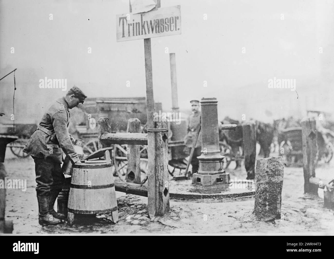 German Sanitary sign near Lodz, between 1914 and c1915. A sign in German &quot;Trinkwasser&quot; (drinking water) next to a pump in Lodz, Poland during World War I. Stock Photo