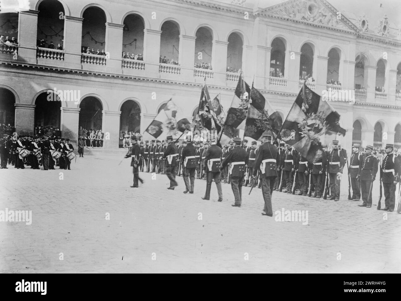 German flags received at Invalides, Paris, 27 Oct 1914 (date created or published later). German flags being paraded by French soldiers at the L'Ho^tel National des Invalides in Paris, France, during World War I. Stock Photo