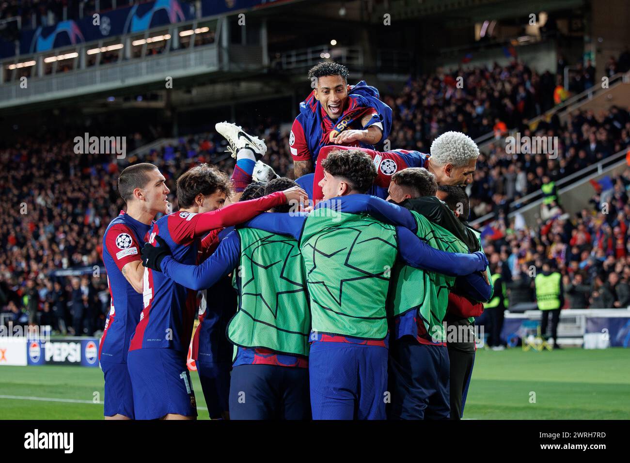 Barcelona, Spain. 12th Mar, 2024. Barcelona players celebrate a goal during the Uefa Champions League match between FC Barcelona and SSC Napoli at the Estadi Olimpic Lluis Companys in Barcelona, Spain. Credit: Christian Bertrand/Alamy Live News Stock Photo