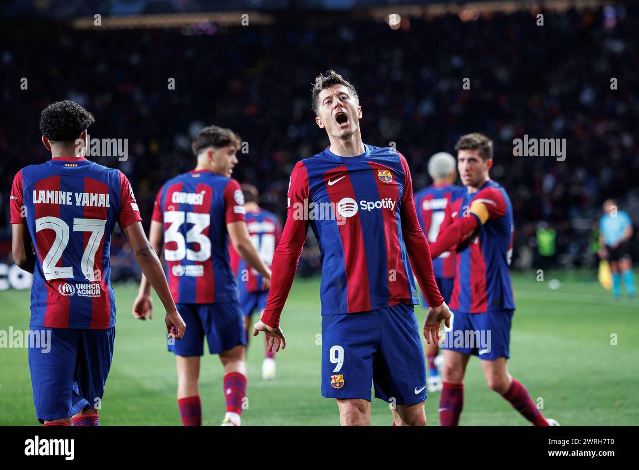 Barcelona, Spain. 12th Mar, 2024. Lewandowski celebrates after scoring a goal during the Uefa Champions League match between FC Barcelona and SSC Napoli at the Estadi Olimpic Lluis Companys in Barcelona, Spain. Credit: Christian Bertrand/Alamy Live News Stock Photo