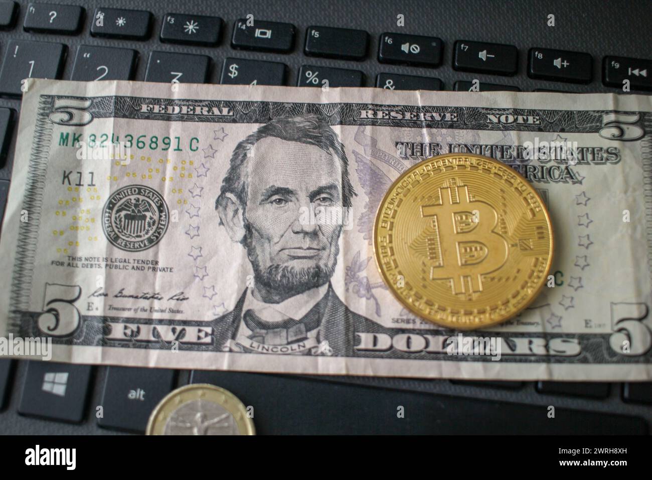 Bitcoin coin against the background of us dollars. A lot of American money  dollars and gold bitcoin. Background of money and cryptocurrency.Money back  Stock Photo - Alamy