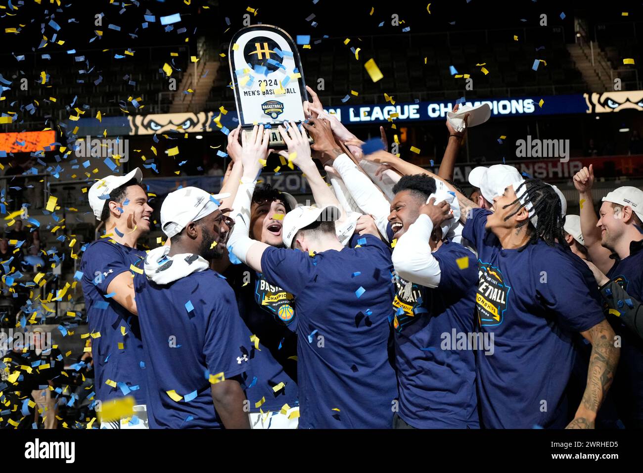 Oakland celebrates after defeating Milwaukee in an NCAA college