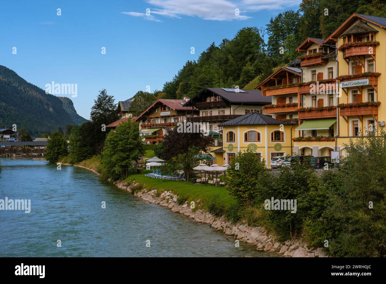 Riverside buildings in the Berchtesgaden town, a popular tourist ...