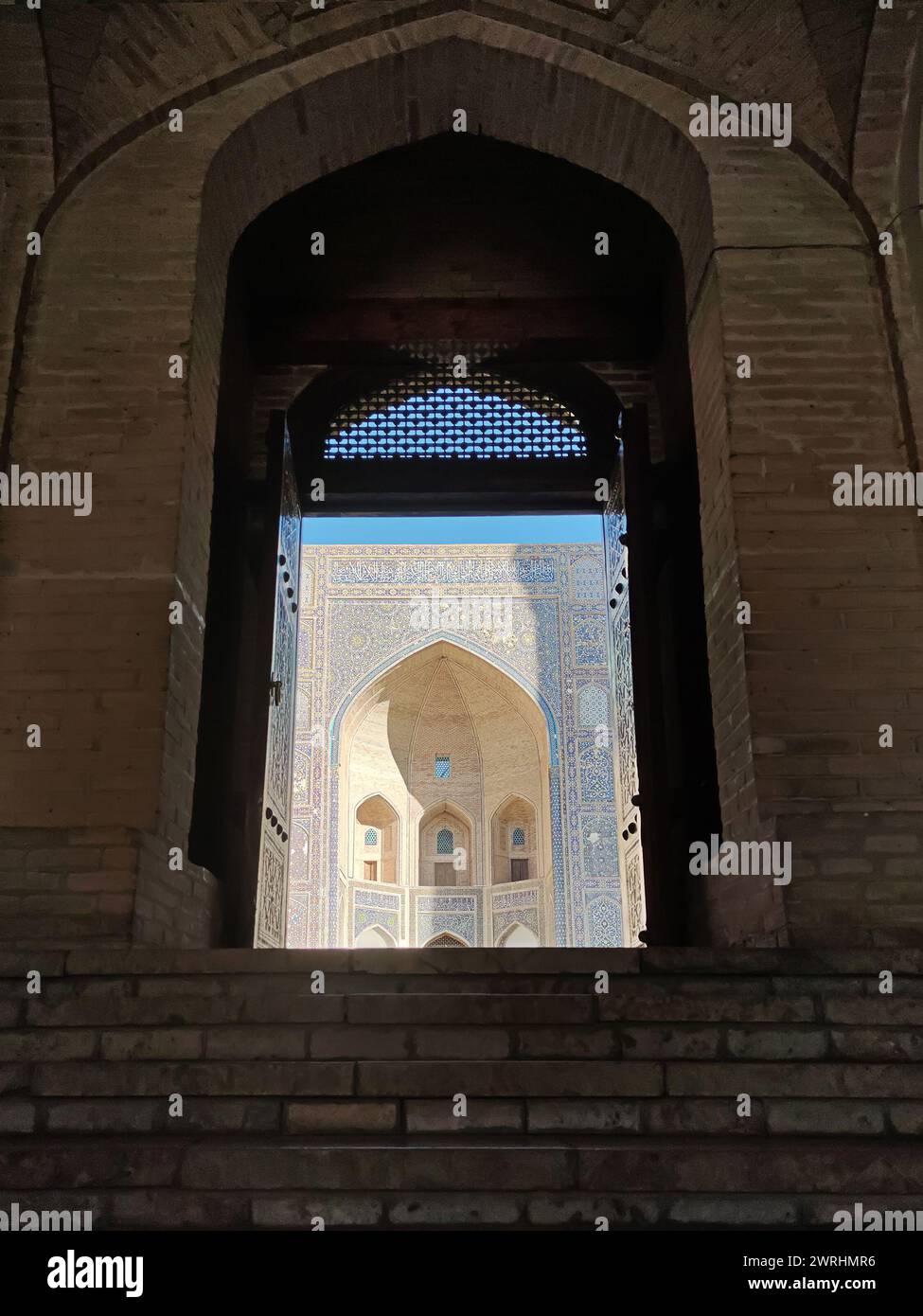 old historical building with a beautiful Dome on the top with a beautiful Blue Marble designs in historical place, southern Uzbekistan, Bukhara. Uzbek Stock Photo
