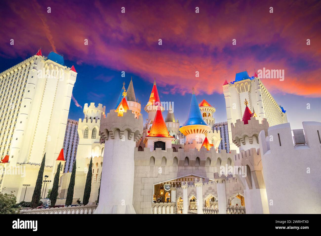 Excalibur Las Vegas Casino at sunset dusk - boulevard strip casinos at night with blue and pink skies - gambling United States USA Stock Photo