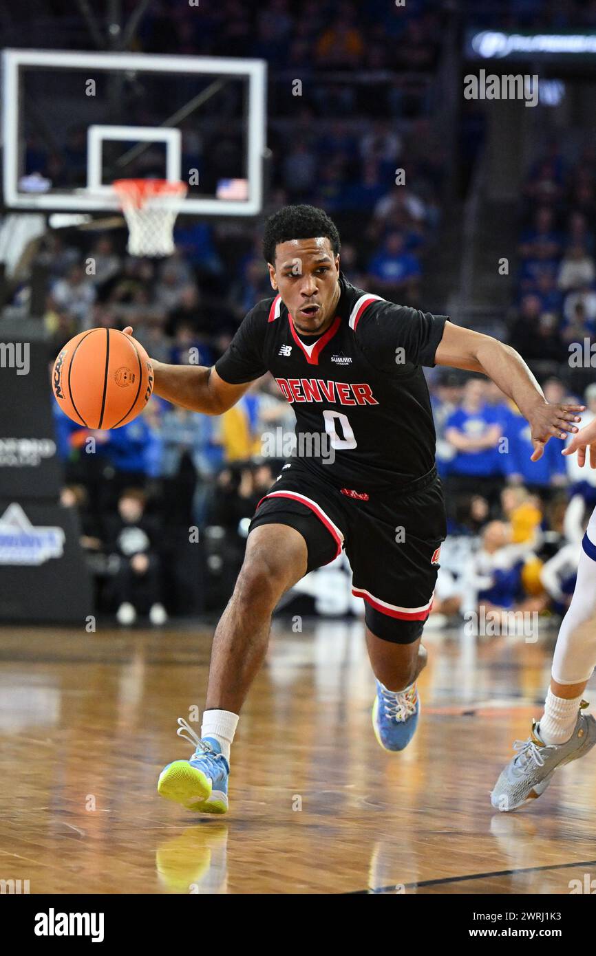 Denver Pioneers guard Tommy Bruner (0) drives to the basket during the
