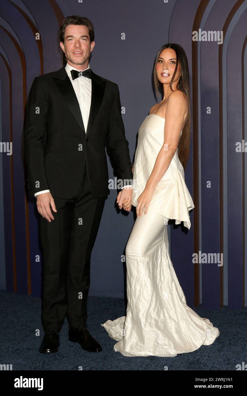 LOS ANGELES - JAN 9:  John Mulaney, Olivia Munn at the 14th Governors Awards at the Dolby Ballroom on January 9, 2024 in Los Angeles, CA Stock Photo