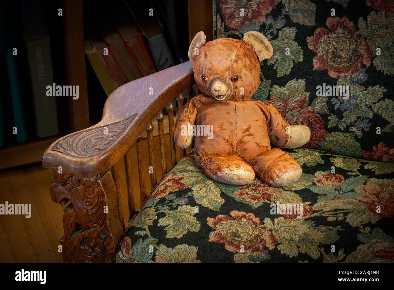Teddy bear sitting on vintage armchair Stock Photo - Alamy