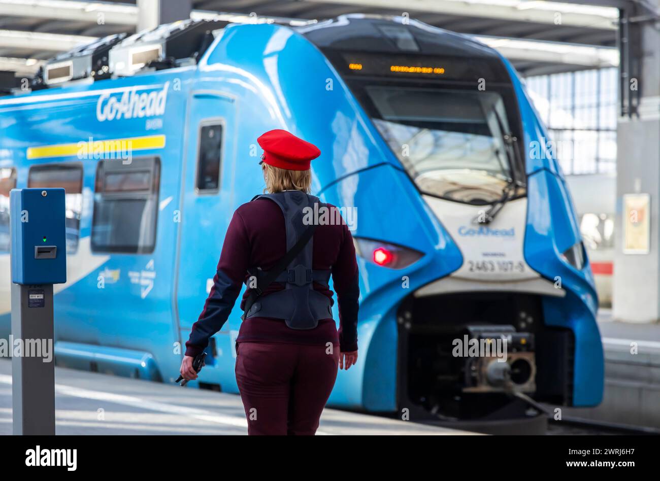 Train supervisor, supervisory officer of Deutsche Bundesbahn, recognisable by the red cap, Go-Ahead regional train, Munich, Bavaria, Germany Stock Photo