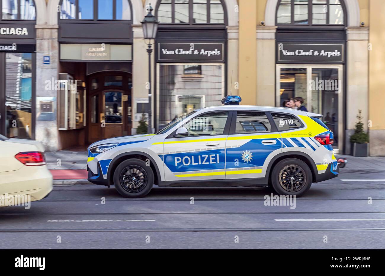 BMW police vehicle, SUV, Bavarian police officers on patrol, Maximilianstrasse Munich, Bavaria, Germany Stock Photo