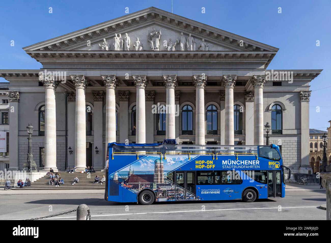 Bus, Sightseeing tour in front of the Bavarian State Opera, Munich, Bavaria, Germany Stock Photo
