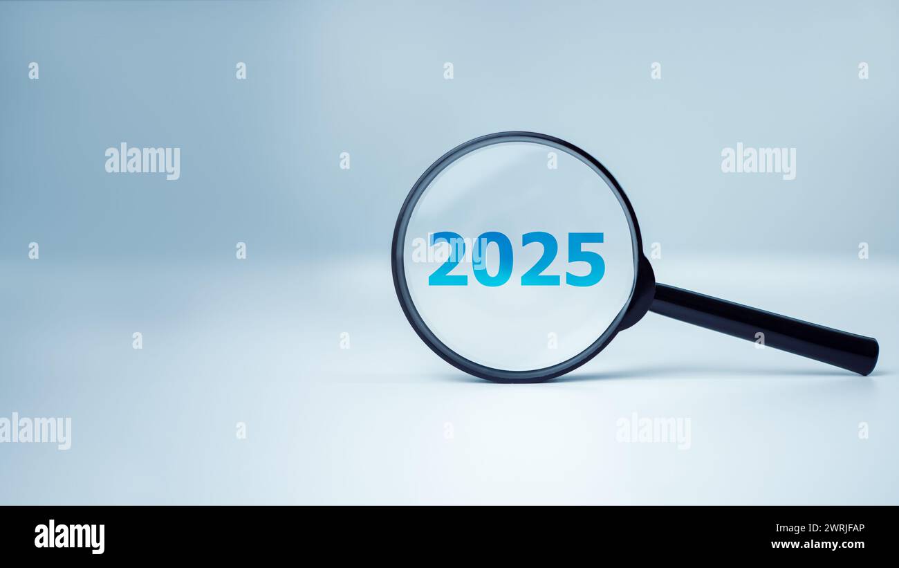 A magnifying glass and text 2025 new year idea concept. Planning goals