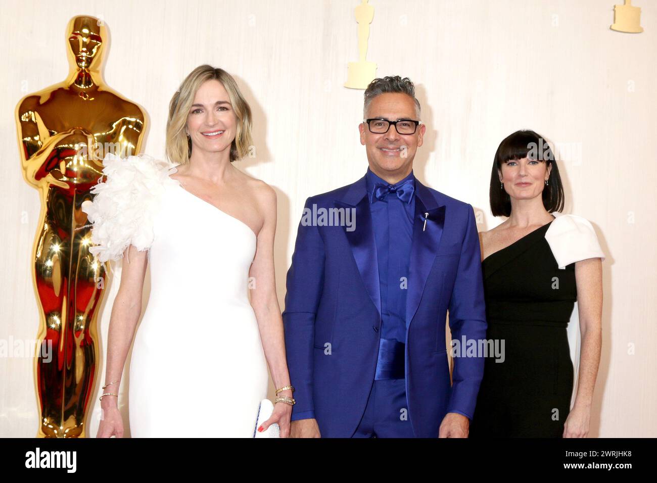 LOS ANGELES - MAR 10:  Molly McNearney, Raj Kapoor, Katy Mullan at the 96th Academy Awards Arrivals at the Dolby Theater on March 10, 2024 in Los Ange Stock Photo