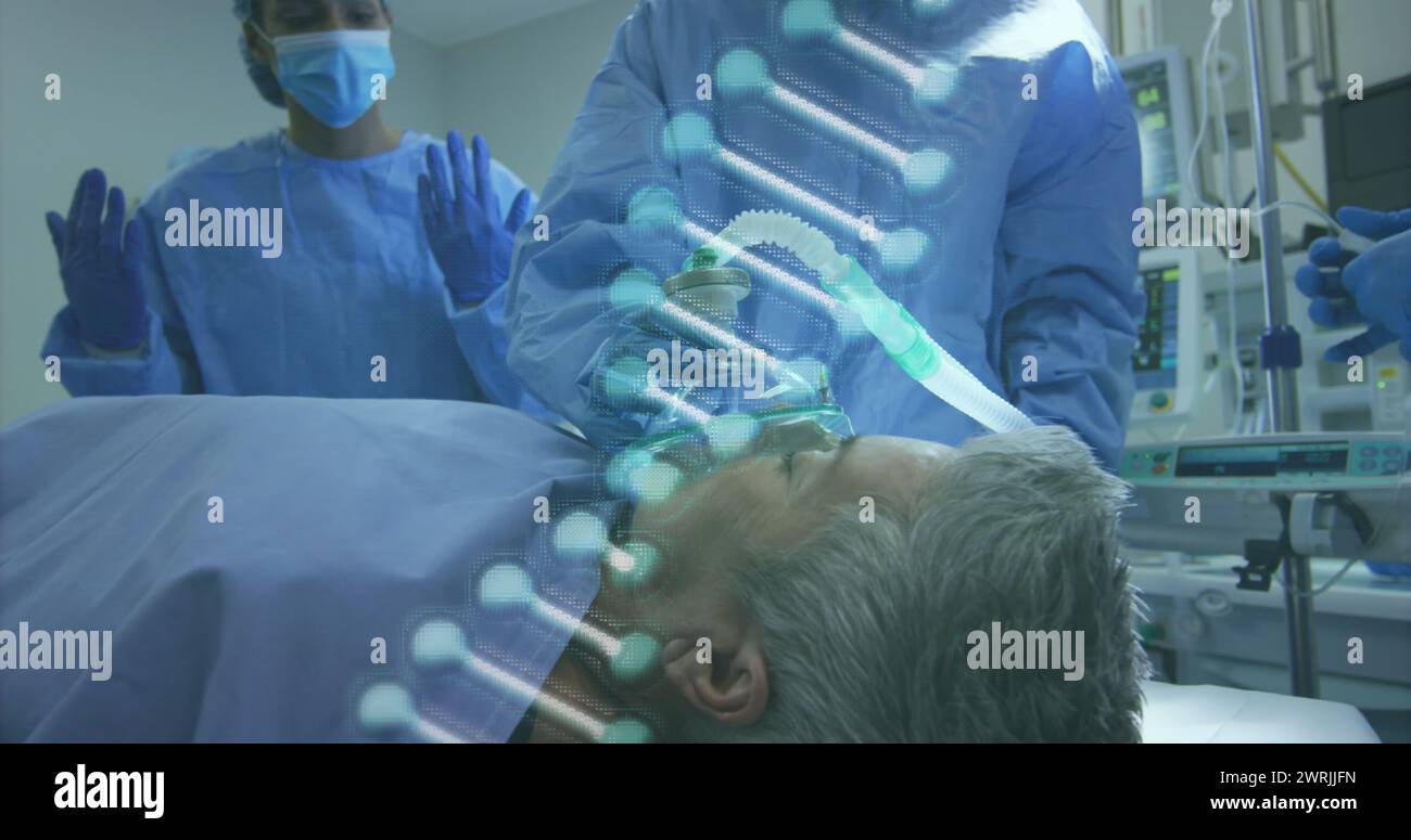 Image of dna over caucasian doctors and senior patient before operation Stock Photo