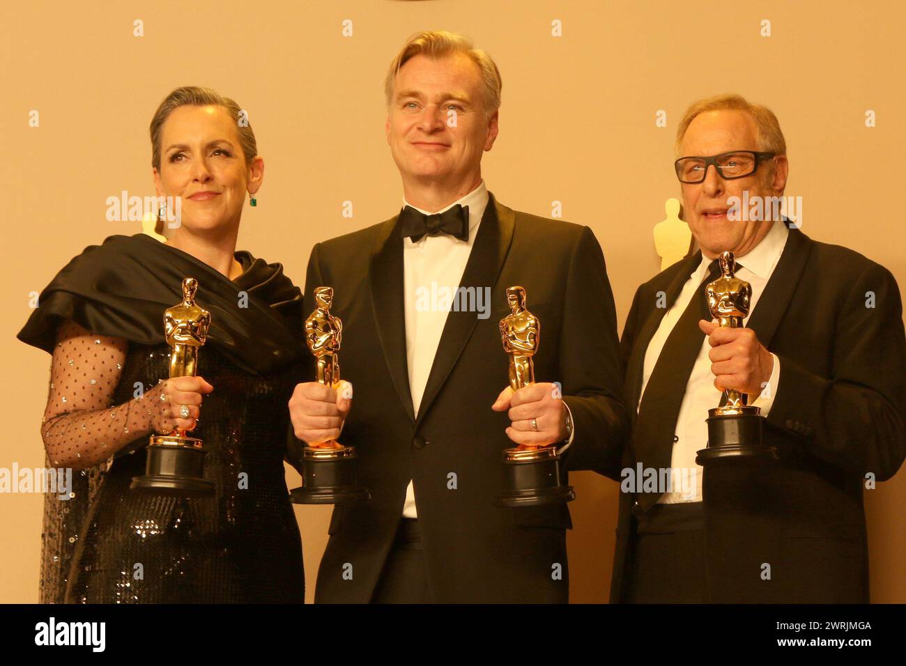 LOS ANGELES - MAR 10:  Christopher Nolan, Emma Thomas, Charles Roven at the 96th Academy Awards Press Room at the Dolby Theater on March 10, 2024 in L Stock Photo