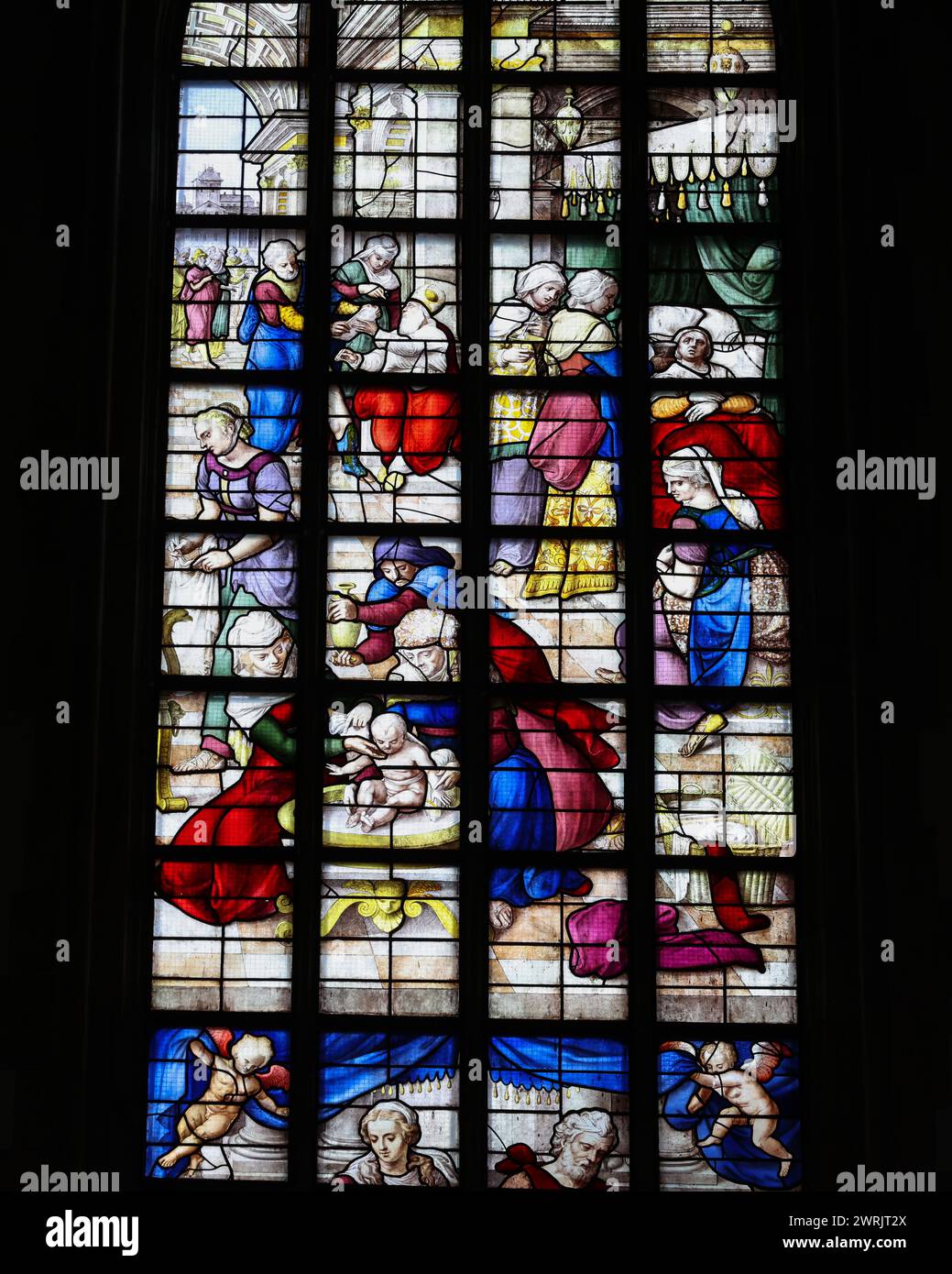 Gouda, the Nehterlands - April 20, 2023: The Stained glass number 11 - Birth of John the Baptist by Lambert van Noort  in the Sint Janskerk Stock Photo
