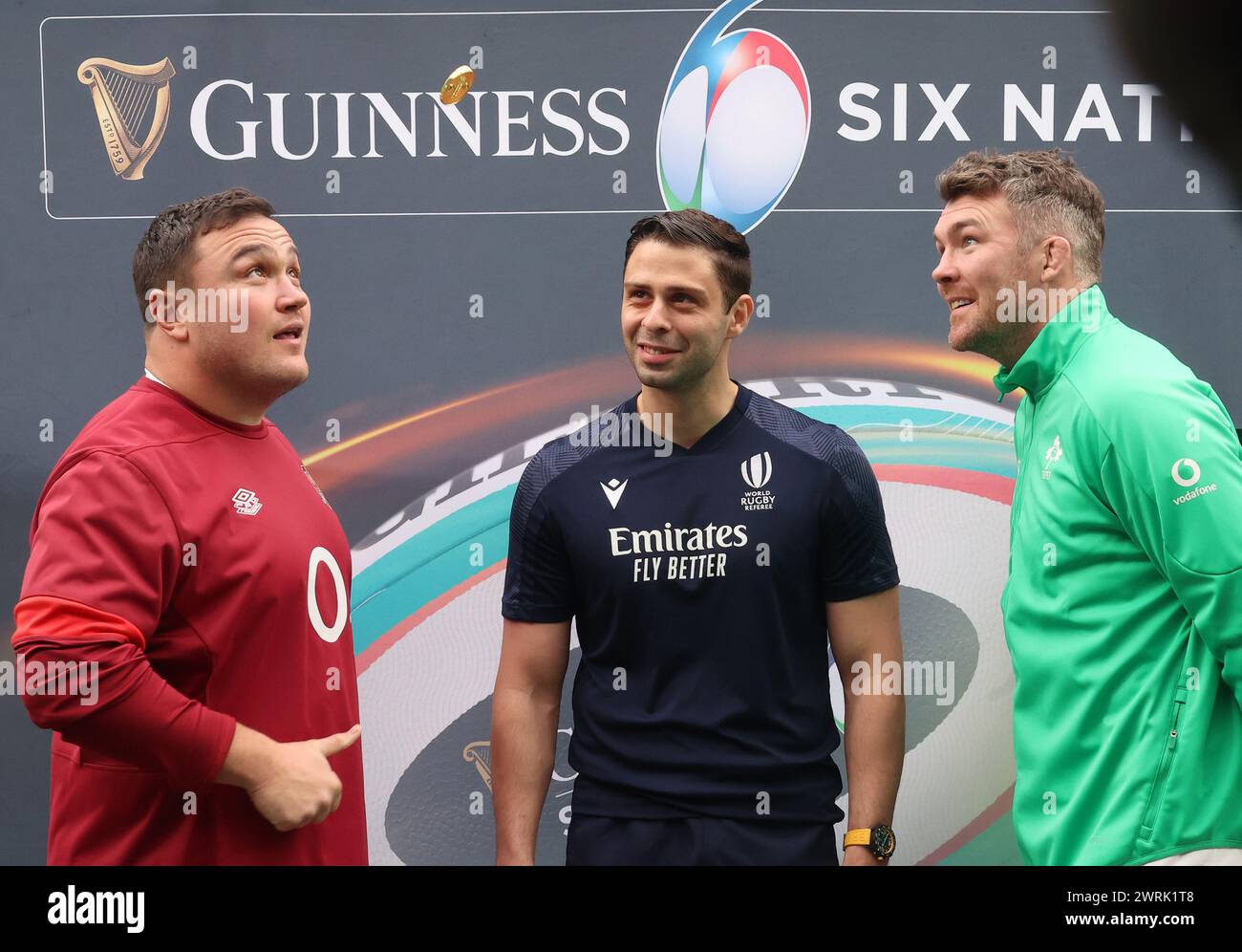 L-R England's Jamie George (Saracens) Referee Nika Amashukeli toss the coin and Peter O'Mahony of Ireland (Munster)  before kick off during Guinness 6 Stock Photo