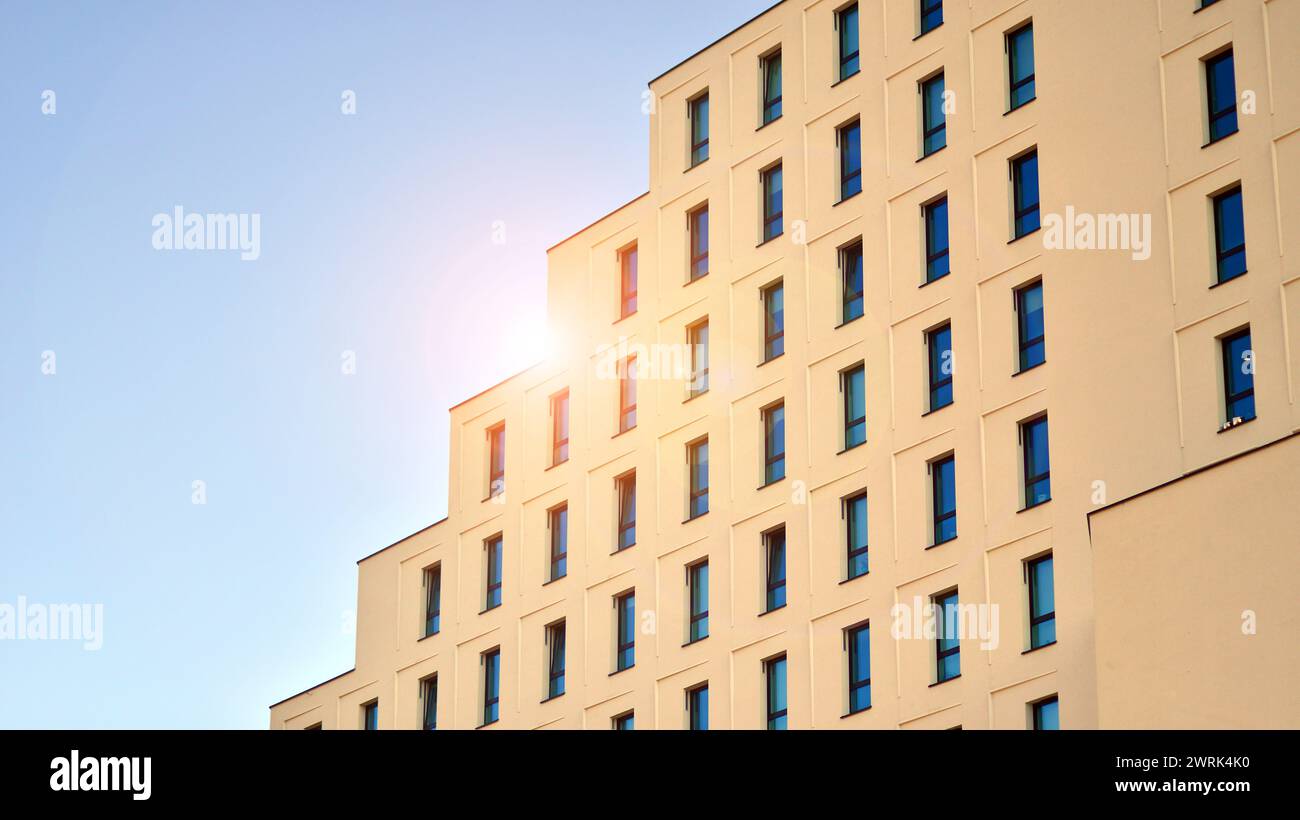 View of a white modern apartment building. Perfect symmetry with blue ... - Apartment Renovation With A Perfect Symmetry